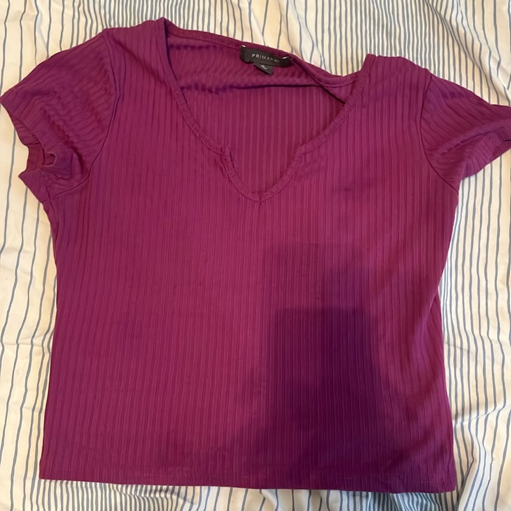 I am selling a cute purple crop top